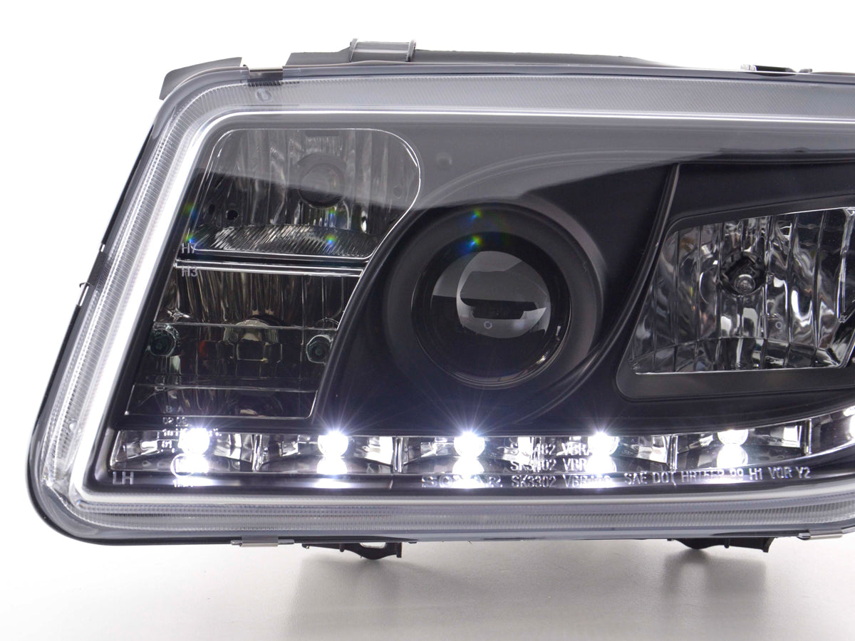 Scheinwerfer Set Daylight LED TFL-Optik VW Bora Typ 1J 99-04 schwarz Scheinwerfer Set Daylight LED TFL-Optik VW Bora Typ 1J 99-04 schwarz